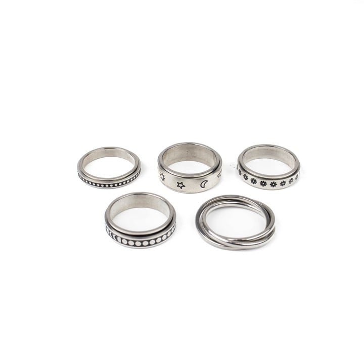 Selection of Five Metal Patterned Spinner Band Rings, Size R½, total weight 23.3g (VAT Only Payable on Buyers Premium)