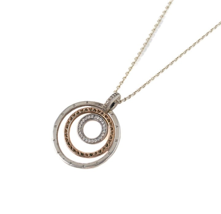 Pandora Silver with Rose Gold Plate Triple Ring Pendant, 3cm and Chain, 59cm, total weight 12.5g. Comes with Pandora Box (Slightly Stained) (VAT Only Payable on Buyers Premium)