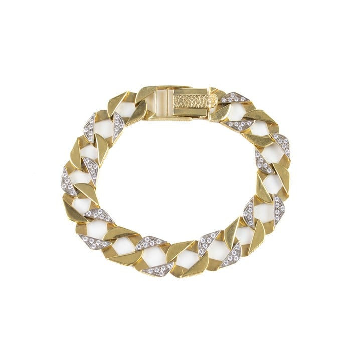 9ct Yellow Gold Textured Clear Stone Set Curb Bracelet, 24cm, 28.6g.  Auction Guide: £400-£500 (VAT Only Payable on Buyers Premium)