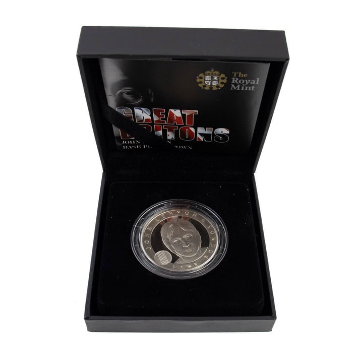 The Royal Mint Great Britons John Lennon Base Proof £5 Coin, comes with presentation box, certificate and outer box. (VAT Only Payable on Buyers Premium)