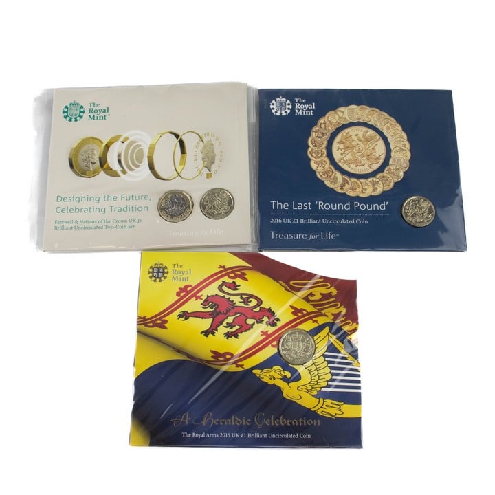 Selection of three £1 Coins, including The Royal Arms 2015, The Last 'Round Pound' 2016 and Designing the Future, Celebrating Tradition 2017 Coin Set, all come with sealed presentation booklets. (VAT