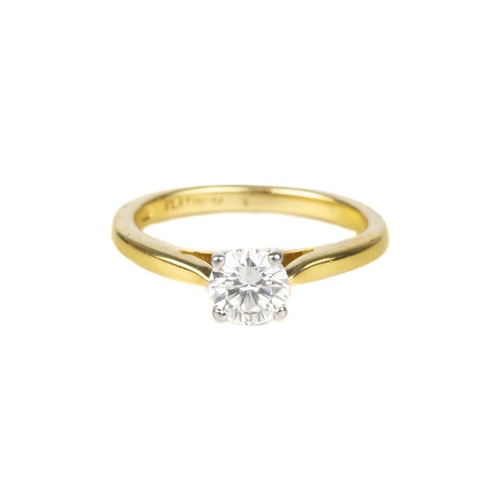 18ct Yellow Gold and Platinum 0.60ct Diamond Solitaire Ring, Size J, 2.9g. Colour I-J, Clarity VS1-VS2.  Auction Guide: £300-£400 (VAT Only Payable on Buyers Premium)