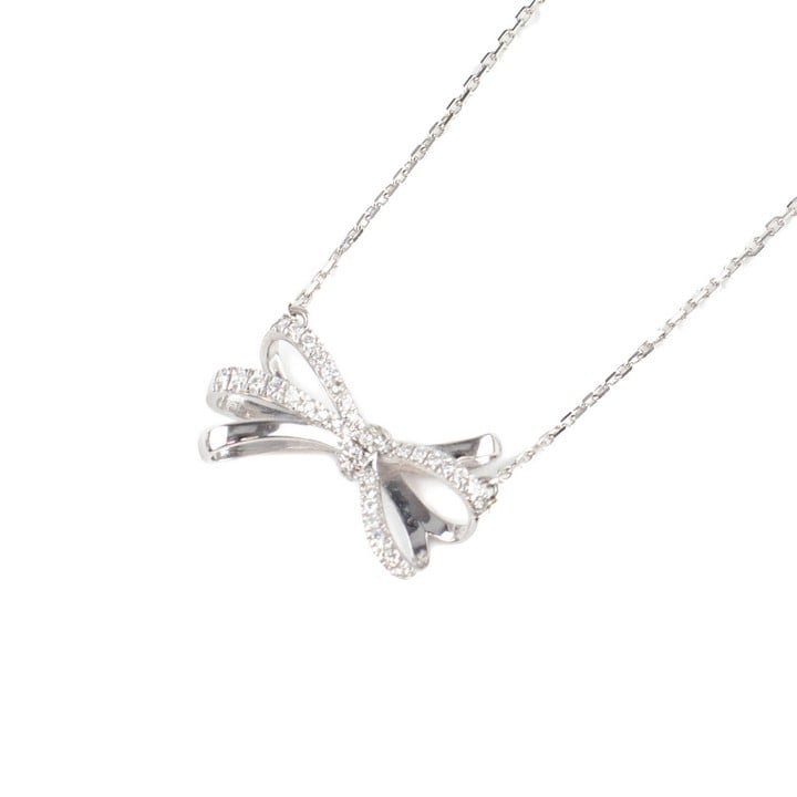 18K White 0.20ct Diamond Bow Pendant, 2.5x1.5cm with Fine Adjustable Chain, 46cm, total weight 5.3g.  Auction Guide: £550-£750