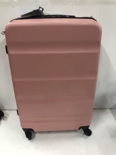 TRAVELLING PINK SUITCASE