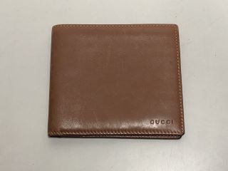 GUCCI BI-FOLD BROWN LEATHER WALLET (VAT ONLY PAYABLE ON BUYERS PREMIUM)