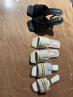 1X FAUX LEATHER STILLETO HEELED BLACK SANDLES SIZE 7 JELLO LATTE SLIP ON SANDLES SIZE 5 HONEY SUCKLE WHITE AND TAN SANDLED WITH LARGE GOLD STUDDING SIZE 3/36