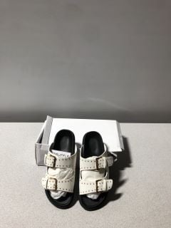 X1 TRUFFLE COLLECTION TWO BUCKLE SANDLES WHITE AND BLACK WITH FAUX GOLD STUDDING SIZE 4/37