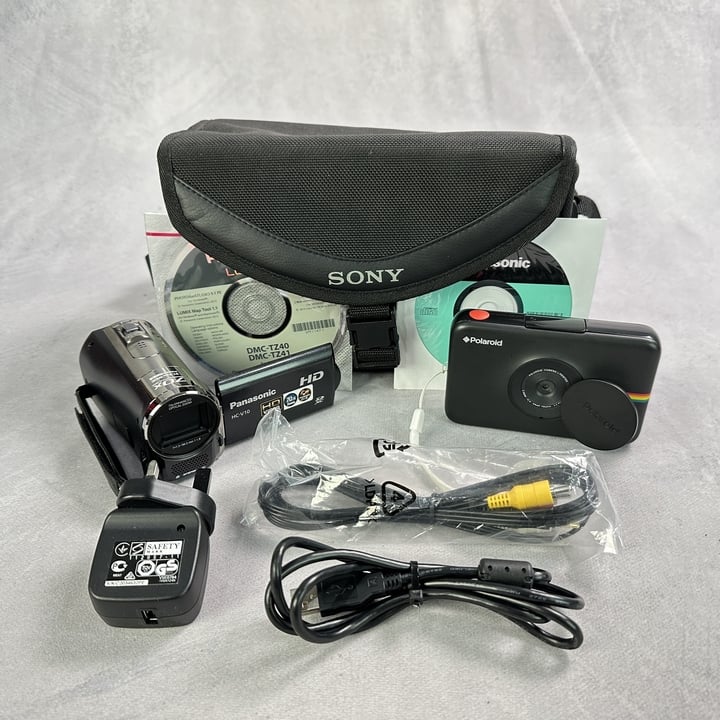 Panasonic V10 HD 720p Camcorder With Charger, Battery And Bag. And Polaroid Snaptouch Digital Camera (MPSH550973/2796) (VAT ONLY PAYABLE ON BUYERS PREMIUM)