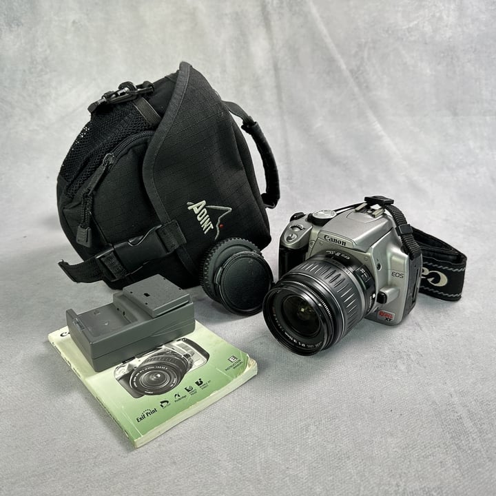 Canon EOS Rebel XT DSLR w/18-55 EF-S Lens And Case , Battery And Charger (MPSE53315660) (VAT ONLY PAYABLE ON BUYERS PREMIUM)