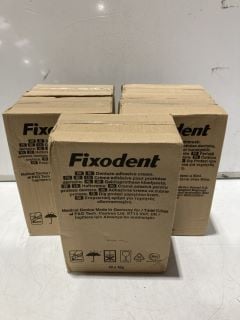 BOX OF FIXODENT PASTE AND BRUSHES