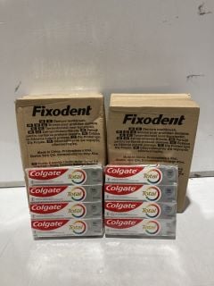 BOX OF ITEMS TO INCLUDE FIXODENT CREAM AND BRUSHES