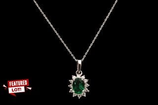 9CT WHITE GOLD OVAL CUT EMERALD & CUBIC ZIRCONIA HALO NECKLACE - RRP £320: LOCATION - FRONT BOOTH