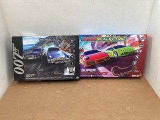 MICRO SCALEXTRIC SUPER SPEED RACE PORSCHE 911 TURBO VS LAMBORGHINI HURACAN EVO RACE SET TO ALSO INCLUDE MICRO SCALEXTRIC 007 ASTON MARTIN V8 VS ASTON MARTIN DB5 BATTERY CHASE SET: LOCATION - B8