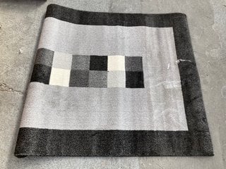 BLACK AND GREY SMALL RUG (ROLLED): LOCATION - B3