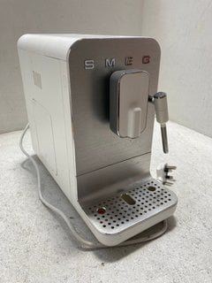 SMEG AUTOMATIC COFFEE MACHINE WITH STEAM WAND - MODEL NO. BCC12EGMEU - RRP £700: LOCATION - AR4