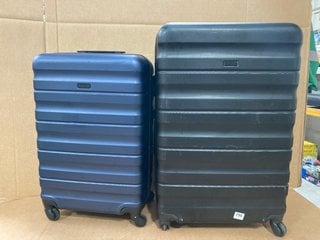 JOHN LEWIS & PARTNERS BLACK LARGE BLACK SUITCASE TO INCLUDE JOHN LEWIS & PARTNERS MEDIUM NAVY BLUE SUITCASE: LOCATION - B20