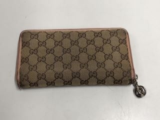 GUCCI ZIP AROUND WALLET (VAT ONLY PAYABLE ON BUYERS PREMIUM)