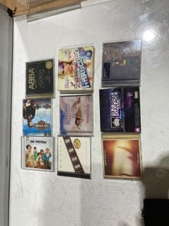 QTY OF ASSORTED ITEMS TO INCLUDE CDS AND DISK HOLDER