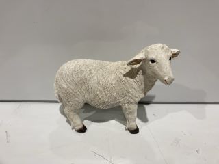 STATUE OF A WHITE SHEEP