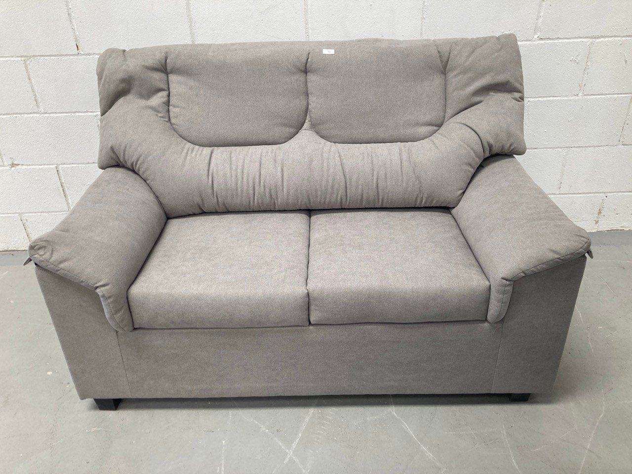 SOFA YUQUE TWO SEATER GREY COLOUR (BROKEN AT THE TOP).