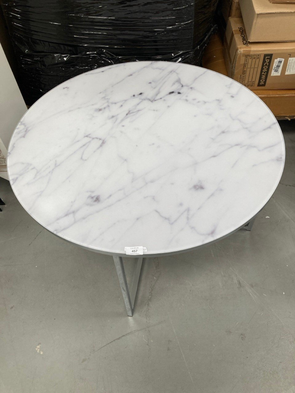 TEMPERED GLASS TABLE WITH MARBLE-COLOURED METAL LEGS.