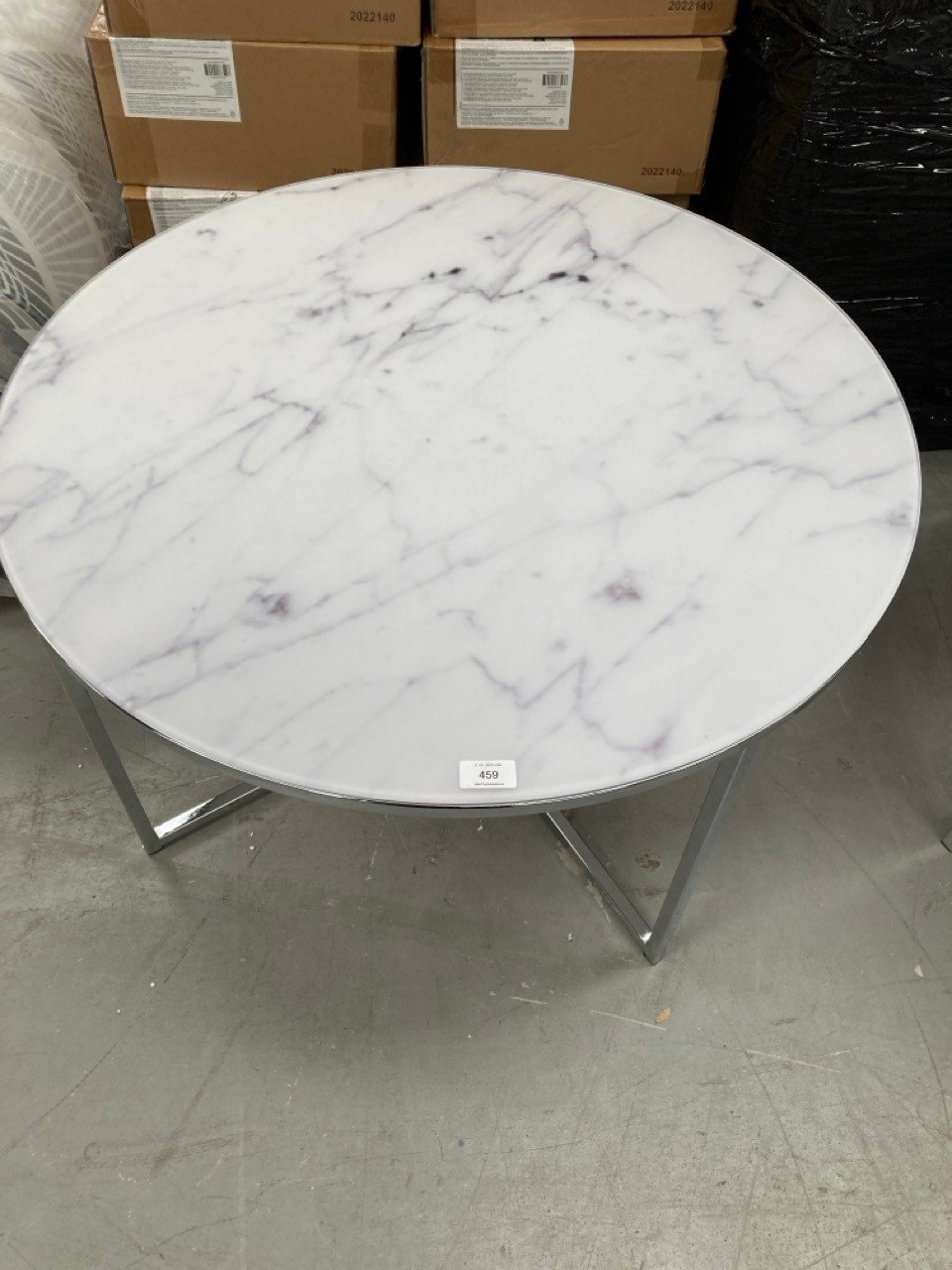 TEMPERED GLASS TABLE WITH MARBLE-COLOURED METAL LEGS.