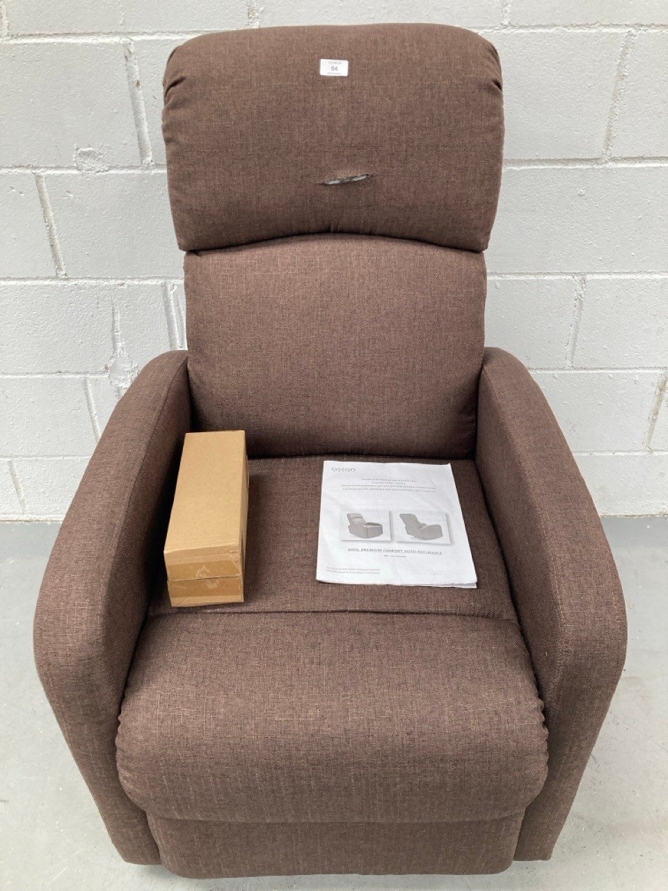 ASTAN HOME RECLINING CAR SEAT BROWN COLOUR (DEFECTIVE IN THE BACKREST).