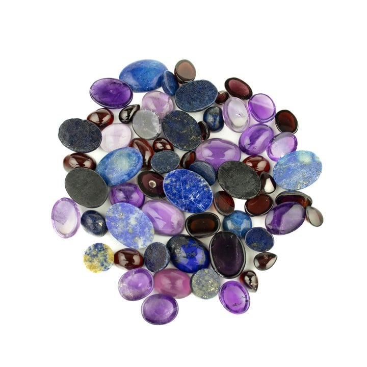 Amethyst, Garnet, Lapis Lazuli Cabochon Mixed-cut Parcel of Gemstones, mixed.  Auction Guide: £150-£200