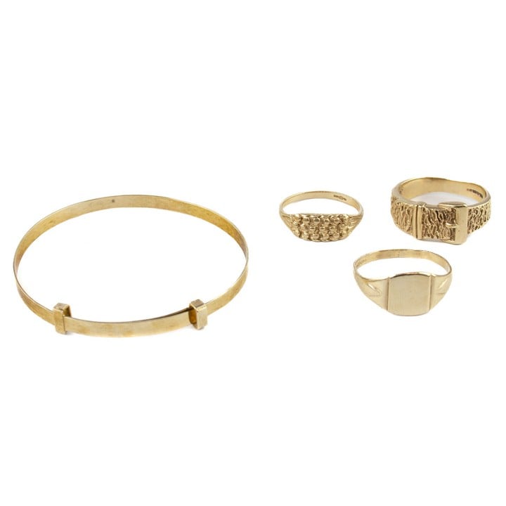 9K Yellow Adjustable Baby Bangle, Buckle Ring, Size M½, Keeper Ring, Size H½, Signet Ring, Size M, total weight 8.3g (All Rings worn and bent) (VAT Only Payable on Buyers Premium)