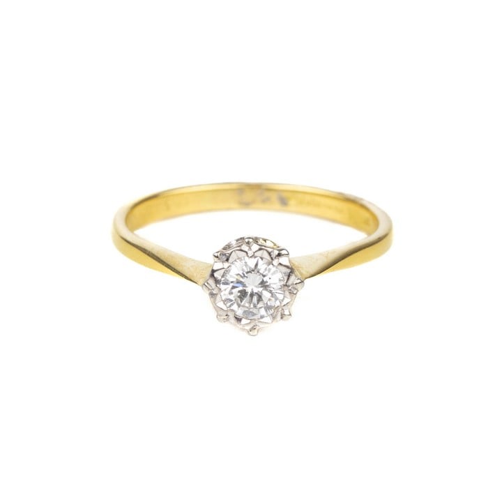 18ct Yellow and White Gold 0.25ct Diamond Illusion Set Solitaire Ring, Size L½, 2.1g. Colour K-L, Clarity VS1-VS2.  Auction Guide: £100-£150 (VAT Only Payable on Buyers Premium)