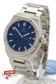 MENS BERNARD REINHARDT WATCH. FEATURING A BLUE DIAL, SILVER COLOURED BEZEL AND STAINLESS CASE, DATE, W/R 5ATM. SILVER COLOURED STAINLESS BRACELET. COMES WITH A WOODEN PRESENTATION CASE: LOCATION - D1