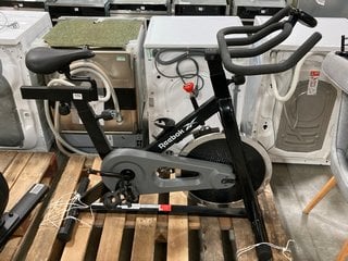 REEBOK EXERCISE BIKE IN BLACK: LOCATION - A5 (KERBSIDE PALLET DELIVERY)