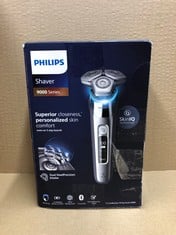 PHILIPS SHAVER SERIES 9000 - WET AND DRY ELECTRIC SHAVER FOR MEN IN CHROME SILVER WITH LIFT AND CUT, SKIN IQ TECHNOLOGY, POP-UP BEARD TRIMMER, CHARGING STAND AND TRAVEL CASE (MODEL S9975/35).: LOCATI