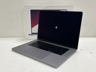 APPLE MACBOOK PRO (16-INCH, 2021) LAPTOP IN SPACE GRAY: MODEL NO A2485 (WITH BOX, MOTHERBOARD REMOVED, SPARES & REPAIRS (IMAGE TO SHOW SCREEN TURNED ON PRIOR TO MOTHERBOARD BEING REMOVED FROM LAPTOP