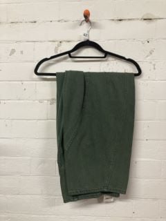 PAIR OF DESIGNER CORD TROUSERS IN GREEN - SIZE M - RRP $148