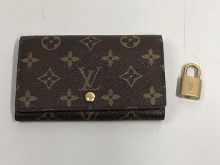 LOUIS VUITTON MONOGRAM BIFOLD WALLET & LOUIS VUITTON PADLOCK 314 WITHOUT KEY (VAT ONLY PAYABLE ON BUYERS PREMIUM)