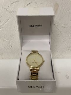 NINE WEST WOMENS CRYSTAL ACCENTED BRACELET WATCH