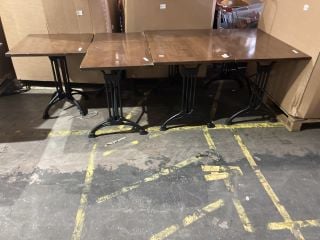 4 X WOODEN PUB STYLE TABLES CAST IRON FEET