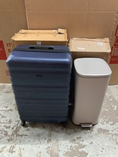 A HARD SHELL SUITCASE AND A PEDAL BIN