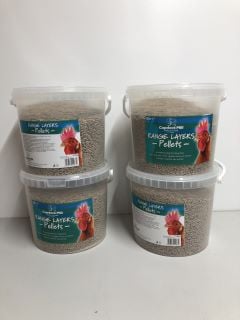 FOUR TUBS OF RANGE LAYERS CHICKEN FOOD