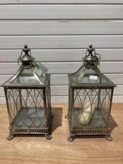 2 X ASSORTED MINSTER METAL GARDEN LANTERNS TO INCLUDE 1 X SWEET VANILLA CANDLE