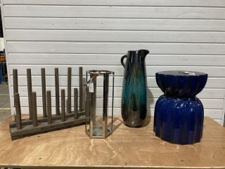 1 X TEAL GIANT PITCHER RRP: £66 1 X WELLINGTON BOOT RACK RRP: £67 1 X SQUARE SILVER HURRICANE LANTERN RRP: £64 1 X 46CM BLUE CERAMIC STOOL