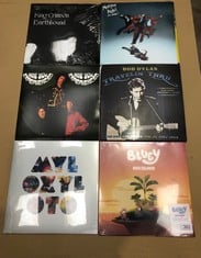 QUANTITY OF VINYLS TO INCLUDE BLUEY: RUG ISLAND SUN ORANGE VINYL: LOCATION - C RACK