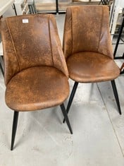 2 X BROWN LOUNGE CHAIRS WITH BLACK LEGS (DAMAGED).