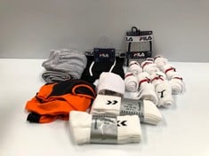 VARIETY OF SPORTING GOODS VARIOUS MODELS AND SIZES INCLUDING PUMA SOCKS -LOCATION 10B.