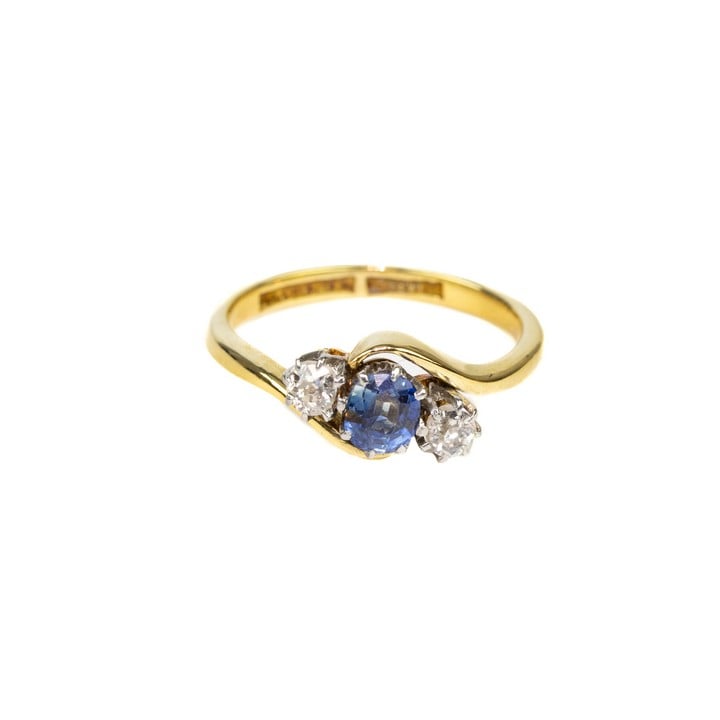 18K Yellow and White Blue Stone and Two Diamonds Twist Ring, Size L½, 3.2g.  Auction Guide: £300-£400 (VAT Only Payable on Buyers Premium)