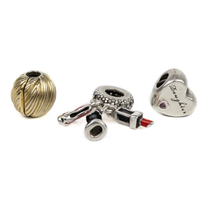 Pandora Silver Three Charms including Gold Plated Textured Clip Ball, Lipstick Dress and Stiletto, Pink Stone Daughter Heart, total weight 10.2g (VAT Only Payable on Buyers Premium)