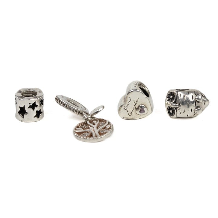 Pandora Silver Four Charms including Family Tree, Grand Daughter Heart, Owl, Cut-out Stars, total weight 11.4g (VAT Only Payable on Buyers Premium)