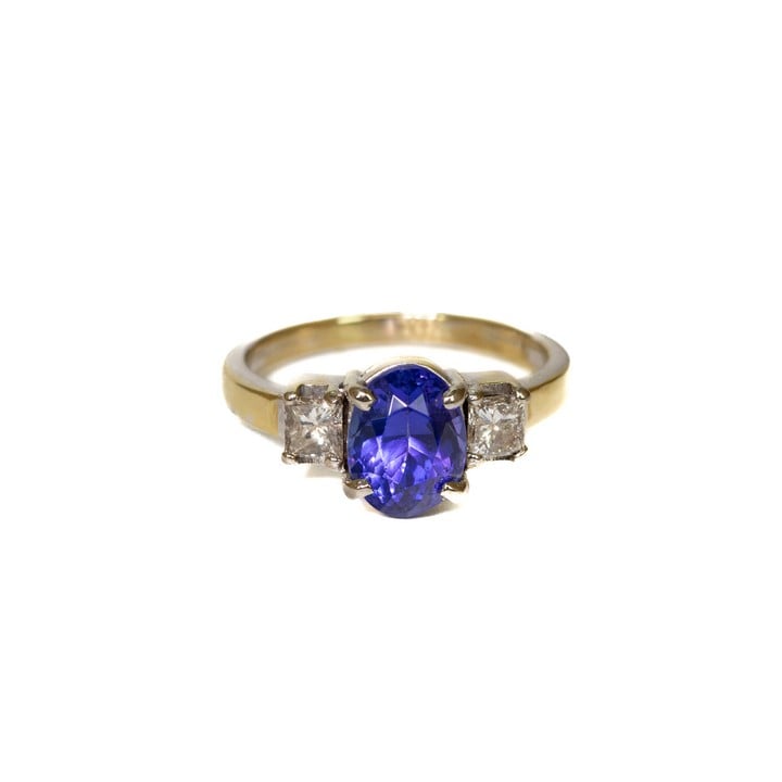 18 White and Yellow 0.50ct Diamond Princess-cut Two Stone and Purple Stone Ring, Size M½, 4.4g.  Auction Guide: £300-£400 (VAT Only Payable on Buyers Premium)