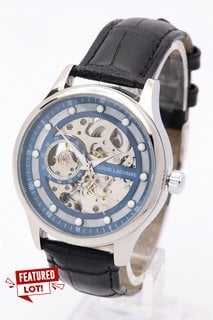 MEN'S LOUIS LACOMBE AUTOMATIC WATCH. FEATURING A BLUE SKELETON DIAL, SILVER COLOURED BEZEL, GLASS EXHIBITION BACK CASE, W/R 3ATM. BLACK LEATHER STRAP. COMES WITH A GIFT BOX: LOCATION - A15